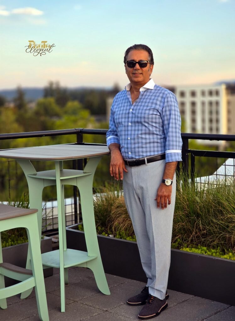 Urban street-style portrait of a well-dressed gentleman walking through the city.