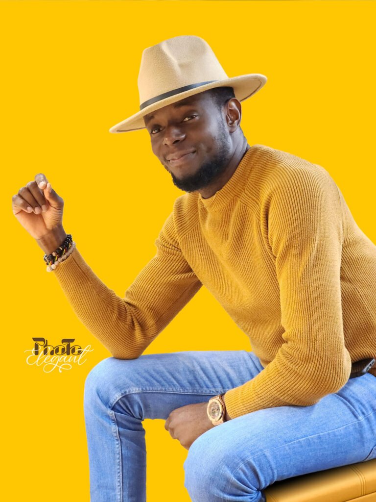 Suave man posing in an elegant contemporary studio portrait by PhotoElegant.